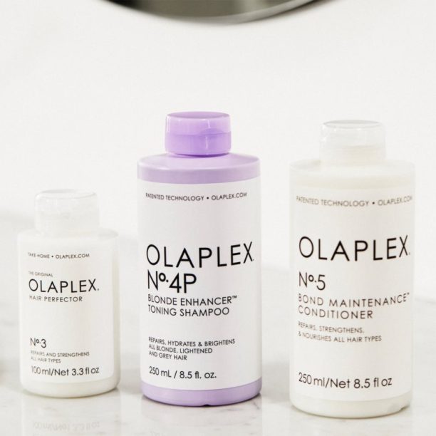 Olaplex N°4P Blond Enhancer Toning Shampoo лилав тониращ шампоан неутрализиращ жълтеникавите оттенъци 250 мл. купи на топ цена