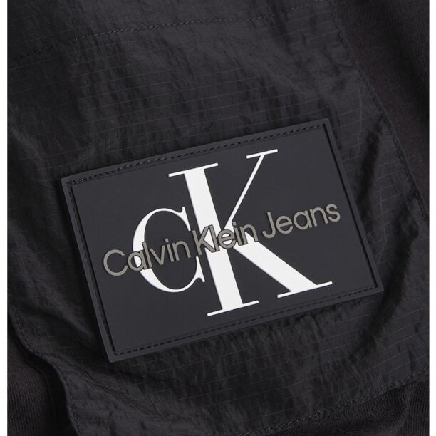 Тениска с овално деколте и джоб на гърдите CALVIN KLEIN JEANS